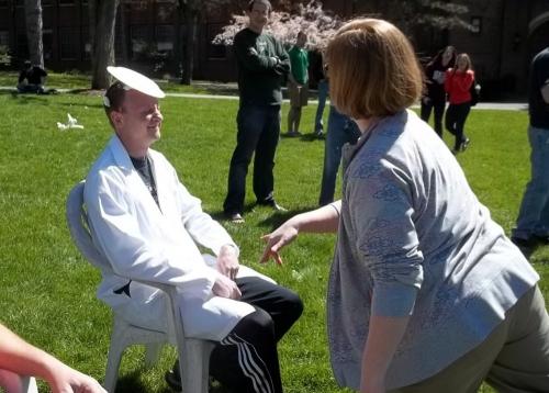 professor getting pied from a distance