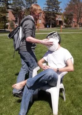 student getting pied