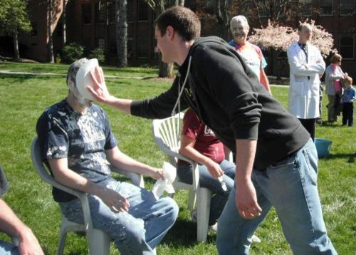 student getting pied