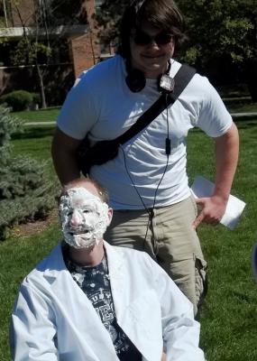 pied professor and student posing
