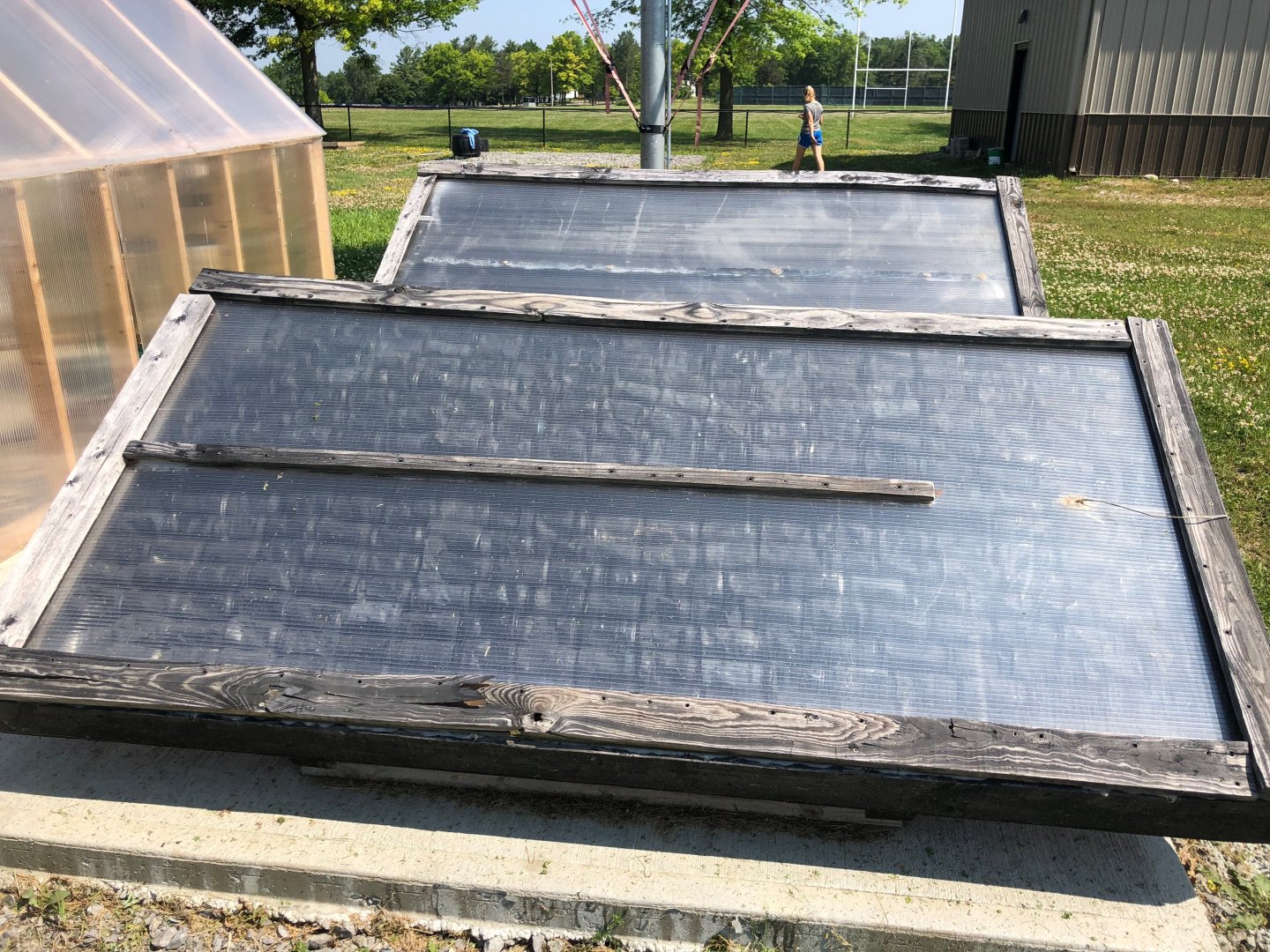 Solar collectors next to the greenhouse