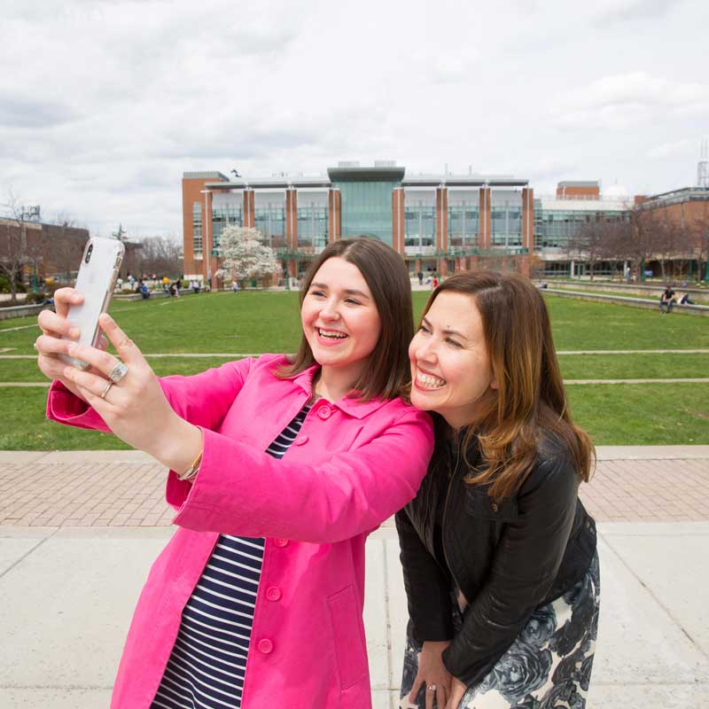 alumni taking selfie