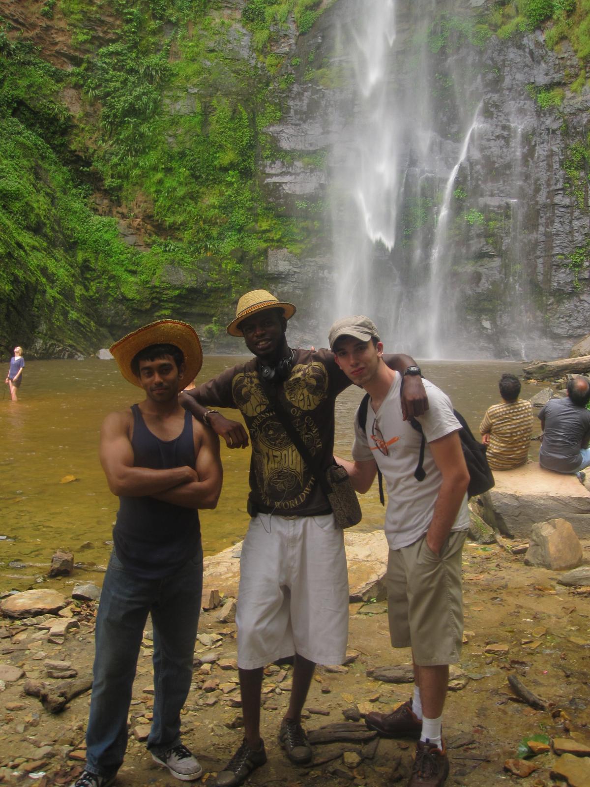 group photo in front of waterfall