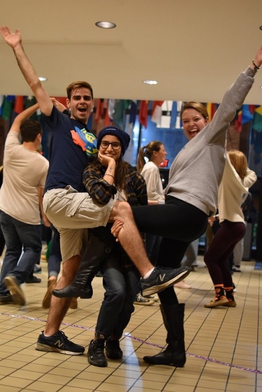 Students posing for a picture at Salsa Con Salsa event