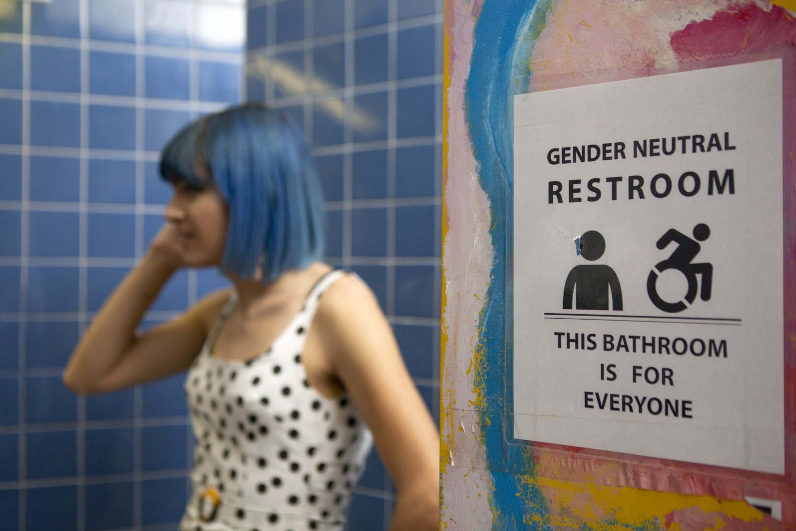 A non-binary femme in an all gender restroom.  Photo by Zackary Drucker; The Gender Spectrum Collection