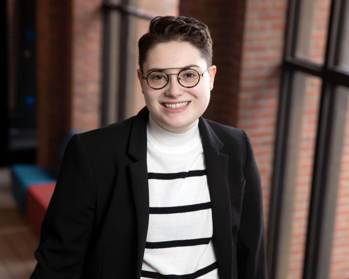 Charlotte Wade, LGBTQ+ Programs and Services Coordinator