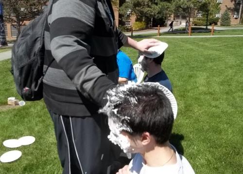 student getting pied