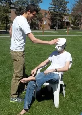 student getting pied