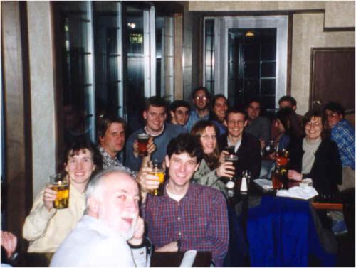 Group of students and professors at dinner