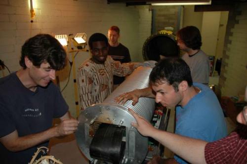 Students working on machine in lab 