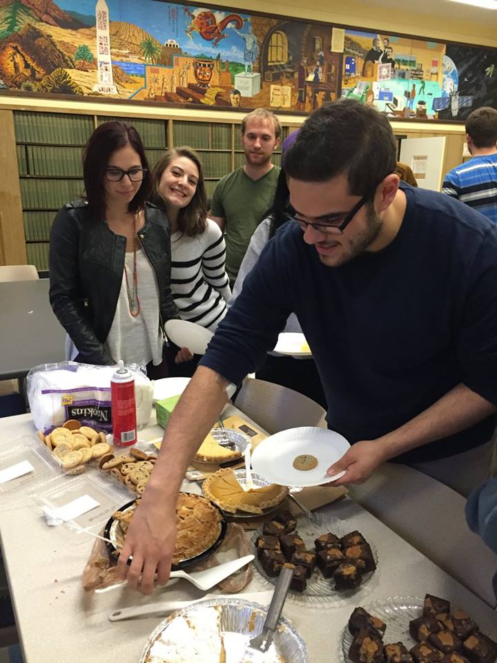 PRISM Math Club: Student taking a slice of pie