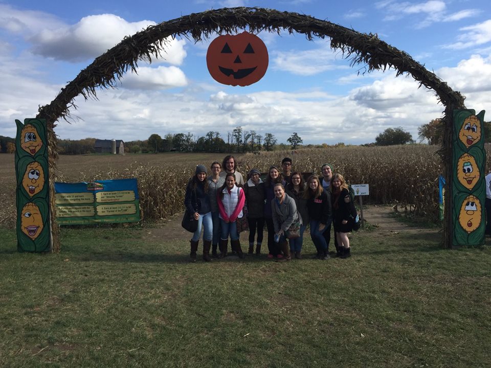 PRISM Math Club: Students posing for a photo at a farm
