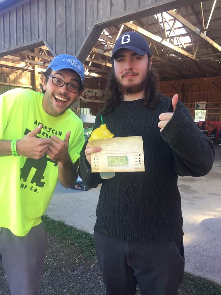 PRISM Math Club: Two students pose for a photo for completing the corn maze challenge