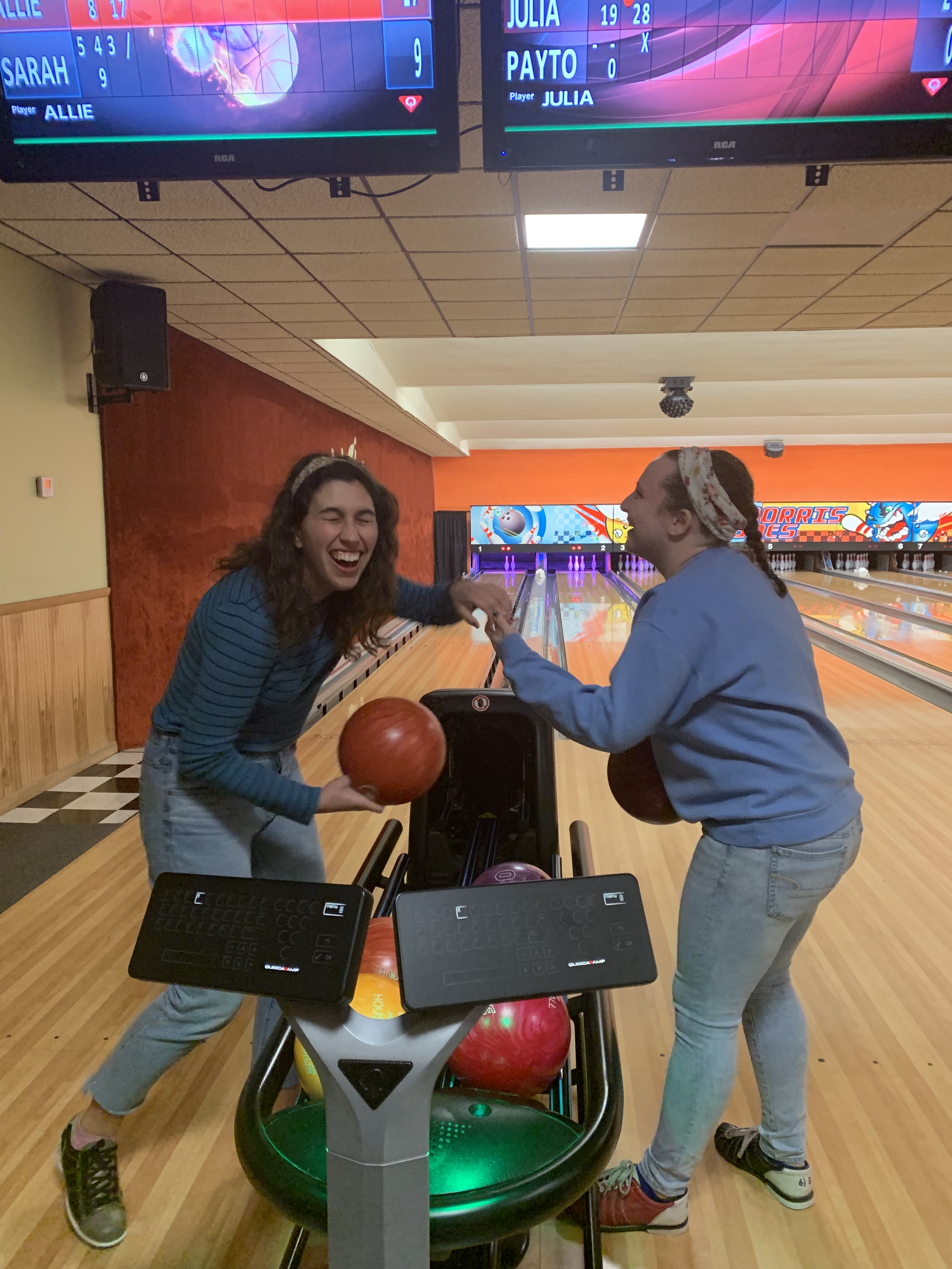 Students bowling and laughing