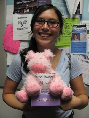 Student with stuffed pig