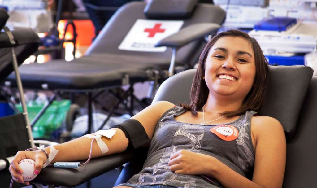 young woman giving blood
