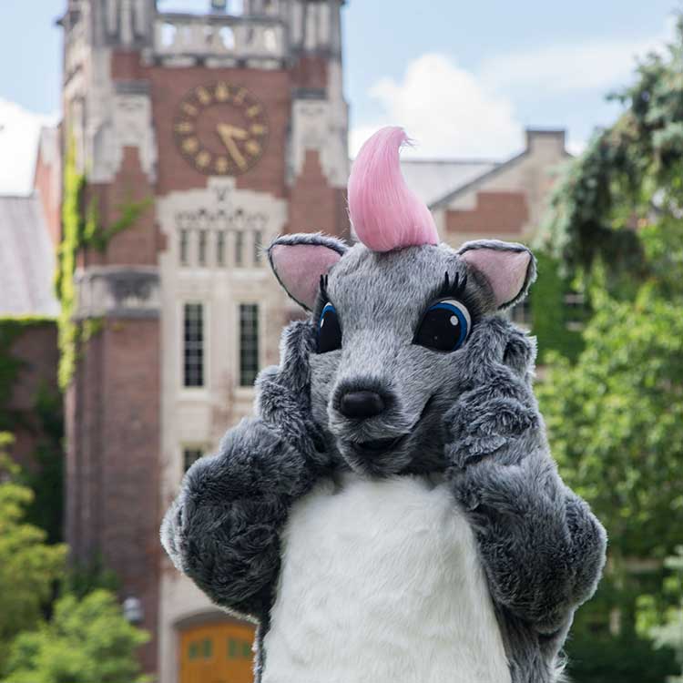 Genny the WGSU mascot in front of Sturges Hall