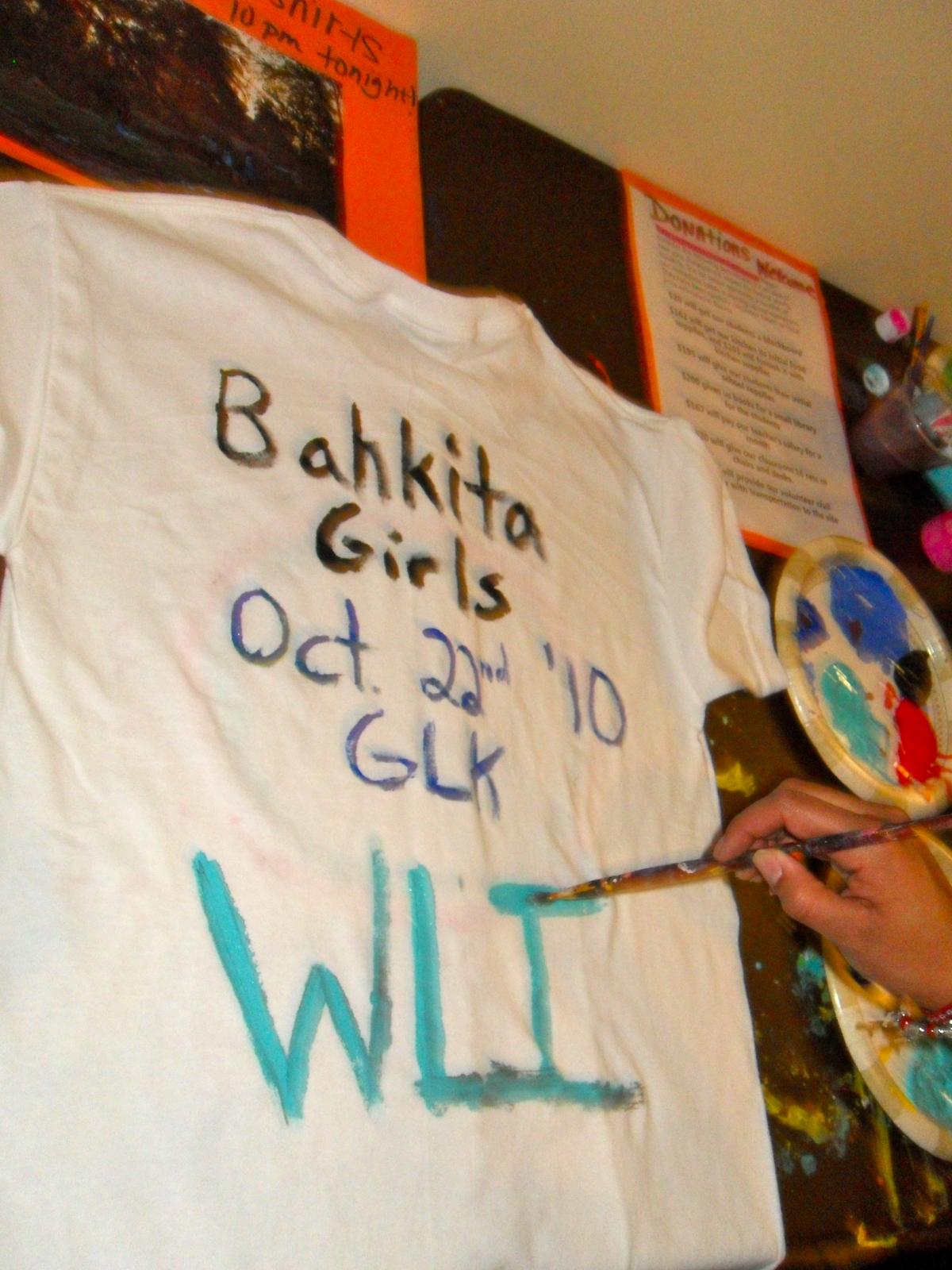 Person painting Bahkita Girls shirt
