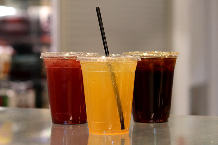Three cups of assorted Tractor Tea beverages available at Jack's.