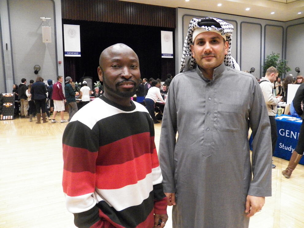 Photo of Dr. Adabra and Professor Akil standing.