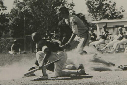 Paul Peterman ’80 tags a runner coming into home plate (1980 Oh-Ha-Daih yearbook).