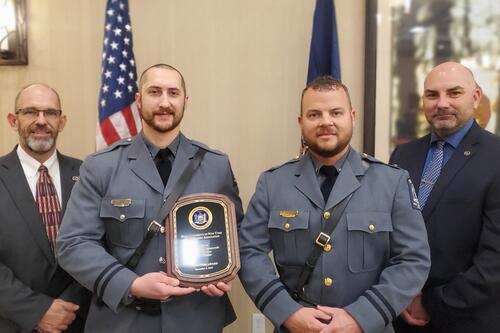 upd officers holding award