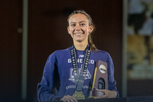 Penelope Greene '25 at the podium from her NCAA win.