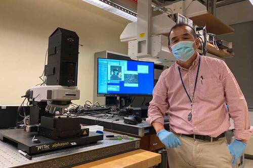 Chemistry professor Kazushige Yokoyama with Raman imaging system
