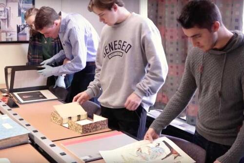 history students working with Special Collections material