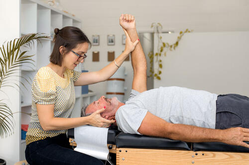 man getting chiropractic adjustment