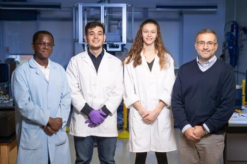 Barnabas Gikonyo, director of introductory chemistry labs and lecture; Wady Jacoby '21; Laura Williams '21; Professor Kevin Militello