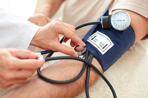 Blood pressure cuff on arm
