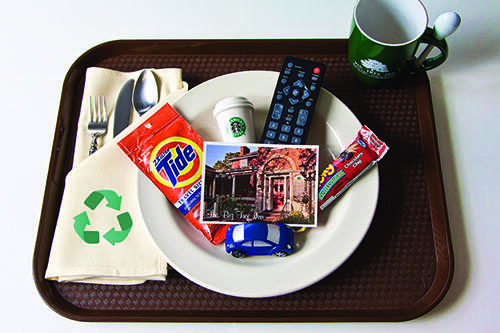 A tray for lunch that indicates things that CAS does to be environmentally friendly