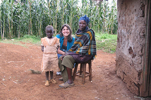 Jen a Gullo with a family in Africa.
