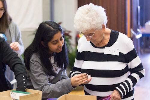 Neha Marolia '18 working with Dottie Manes of Avon, N.Y. during the MLK event in 2017.