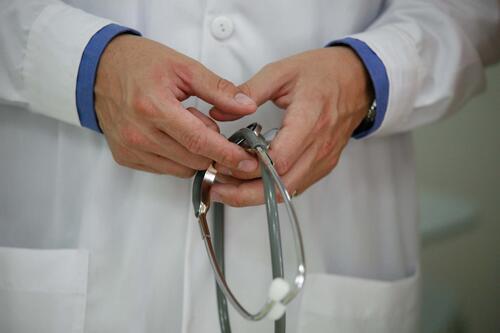 Doctor holding stethoscope