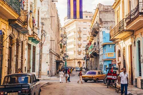 Cuban street scene, used in the symposium flyer Cuban street scene, used in the symposium flyer