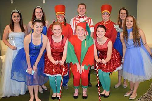 Student volunteers dressed for a parade