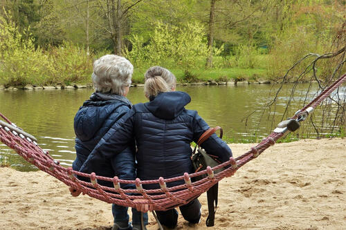 Mother and daughter on hammock