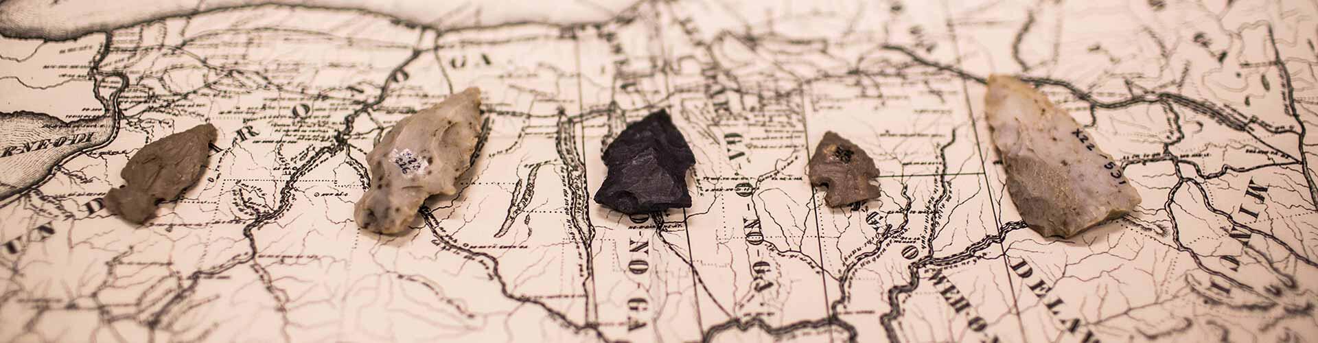 Artifacts resting on a map.
