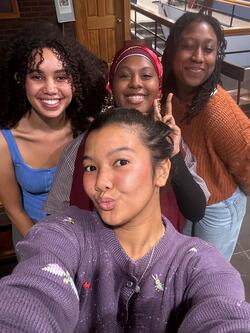 Four students posing for a selfie