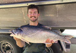 Ryan Bohen '22 with a fish.