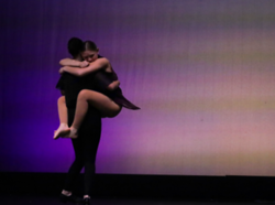 dancer holding another dancer