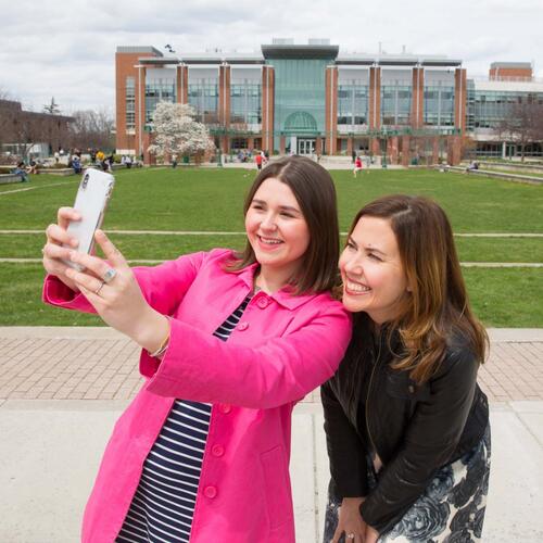 Two alums taking a selfie