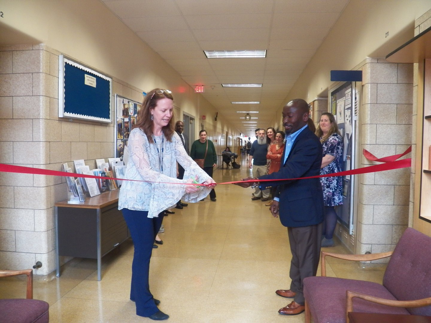 Provost cutting ribbon