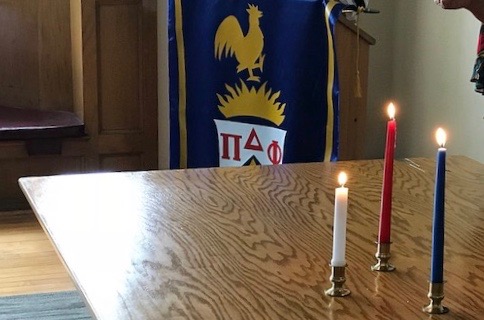 candles and banner