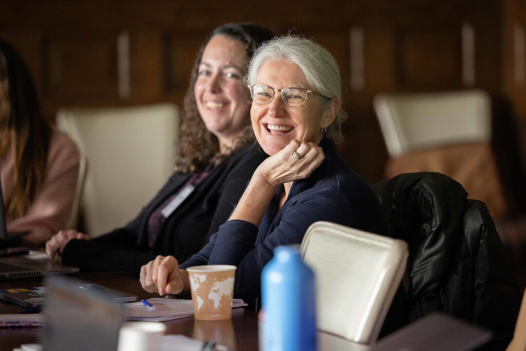 Gillian Paku smiling at an academic workshop in 2025