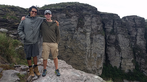 justen Geddes on a  hike with a local guide.