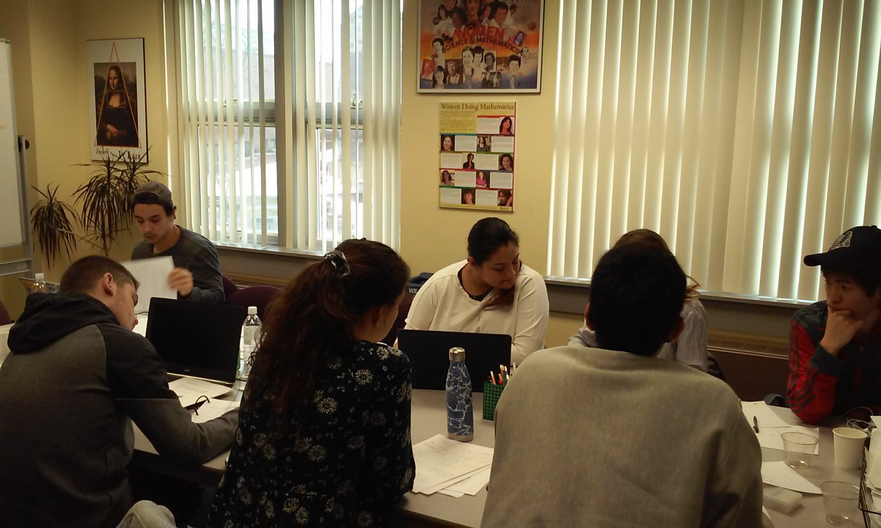 Dr. Pamela Harris lead a group of students working on a problem on Invisible Lattice Points.4