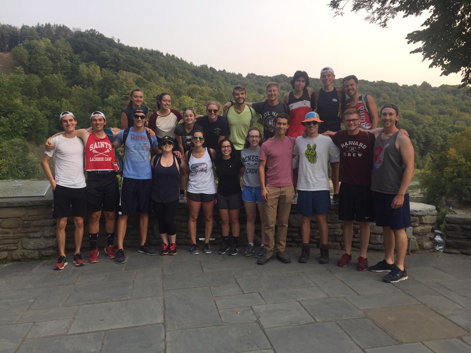 Geneseo Varsity Women's Crew team rowing on the patio